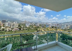 Меблированная квартира планировки 1+1 в жилом комплексе района Махмутлар