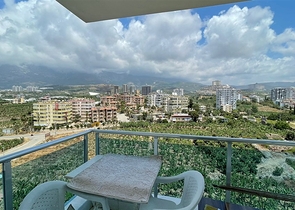 Меблированная квартира планировки 1+1 в жилом комплексе района Махмутлар