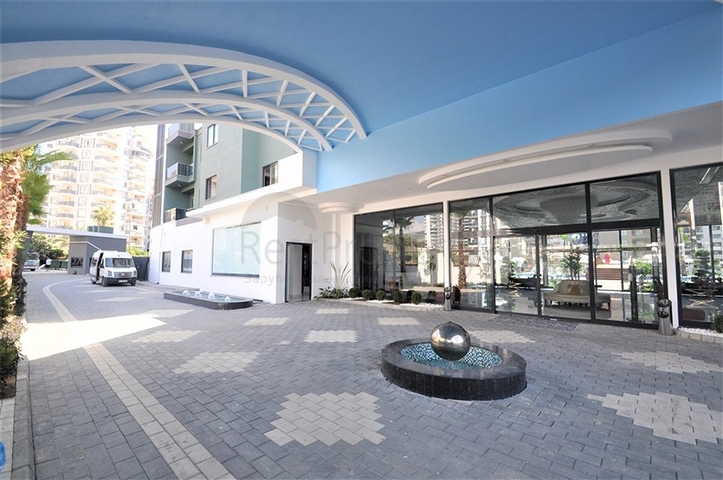 Трехкомнатная квартира в районе Махмутлар