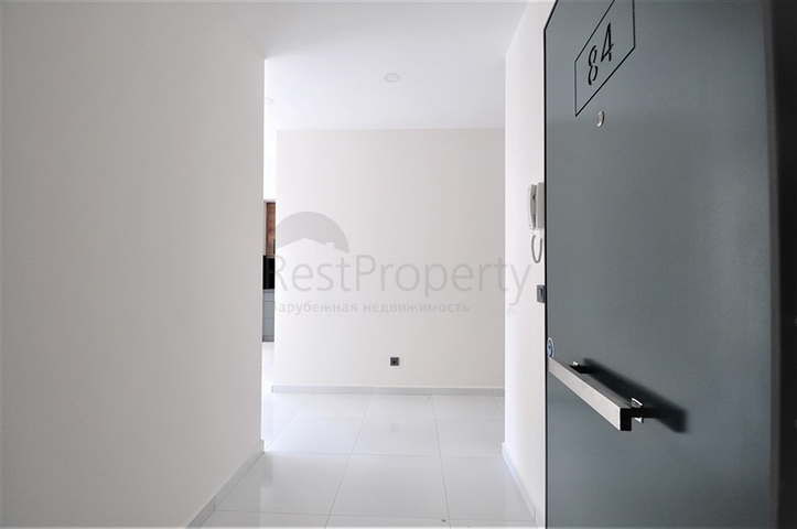 Трехкомнатная квартира в районе Махмутлар