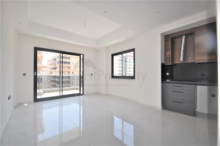 Трехкомнатная квартира в районе Махмутлар