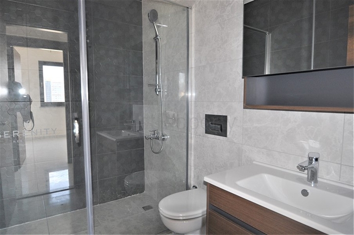 Трехкомнатная квартира в районе Махмутлар