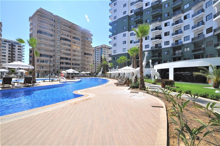 Трехкомнатная квартира в районе Махмутлар