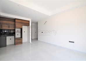 Трехкомнатная квартира в районе Махмутлар