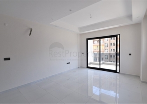 Трехкомнатная квартира в районе Махмутлар