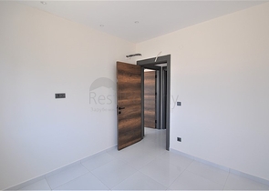 Трехкомнатная квартира в районе Махмутлар