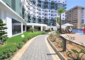 Трехкомнатная квартира в районе Махмутлар