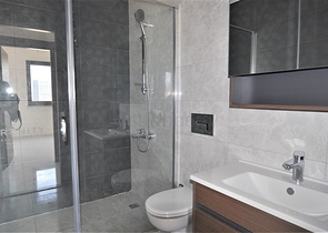 Трехкомнатная квартира в районе Махмутлар