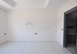 Трехкомнатная квартира в районе Махмутлар