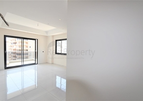 Трехкомнатная квартира в районе Махмутлар