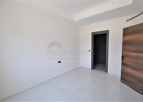 Трехкомнатная квартира в районе Махмутлар