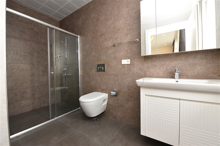 Четырехкомнатный пентхаус с панорамным видом на море в районе Махмутлар