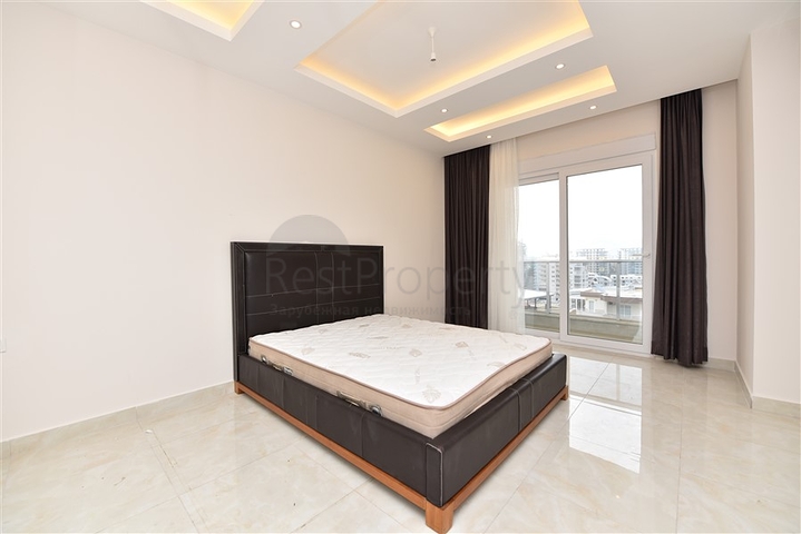 Четырехкомнатный пентхаус с панорамным видом на море в районе Махмутлар