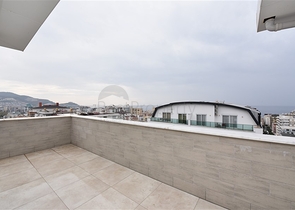 Четырехкомнатный пентхаус с панорамным видом на море в районе Махмутлар