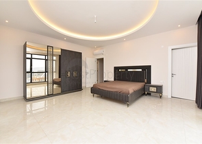 Четырехкомнатный пентхаус с панорамным видом на море в районе Махмутлар