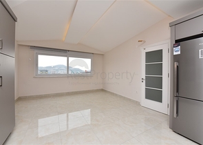 Четырехкомнатный пентхаус с панорамным видом на море в районе Махмутлар