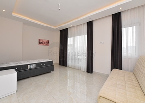 Четырехкомнатный пентхаус с панорамным видом на море в районе Махмутлар