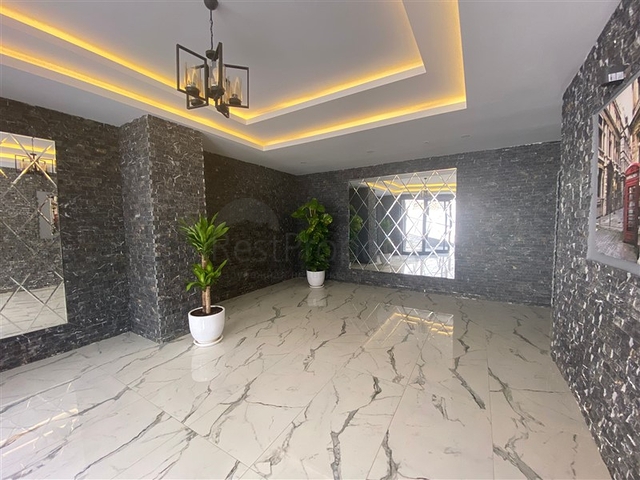 Квартира 1+1 в небольшом уютном комплексе в районе Махмутлар 