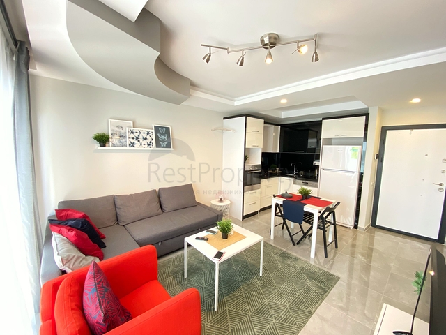 Стильная меблированная квартира в районе Махмутлар