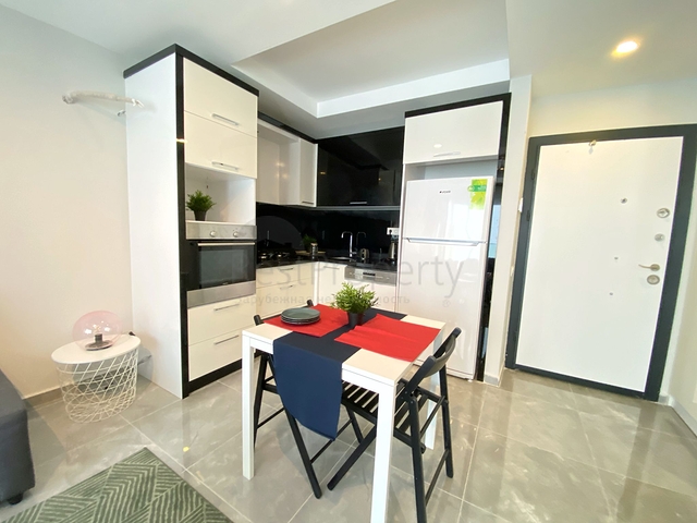 Стильная меблированная квартира в районе Махмутлар