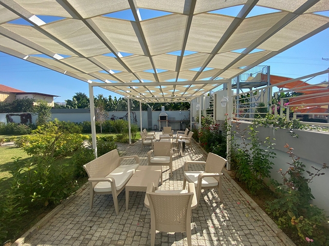 Стильная меблированная квартира в районе Махмутлар