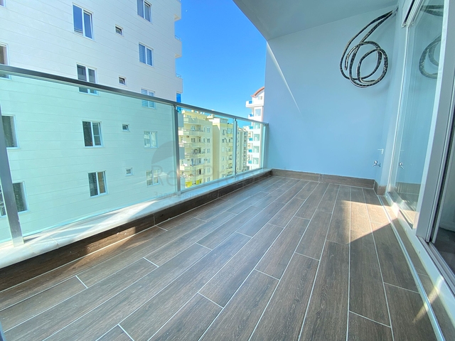 Стильная меблированная квартира в районе Махмутлар