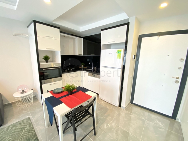 Стильная меблированная квартира в районе Махмутлар