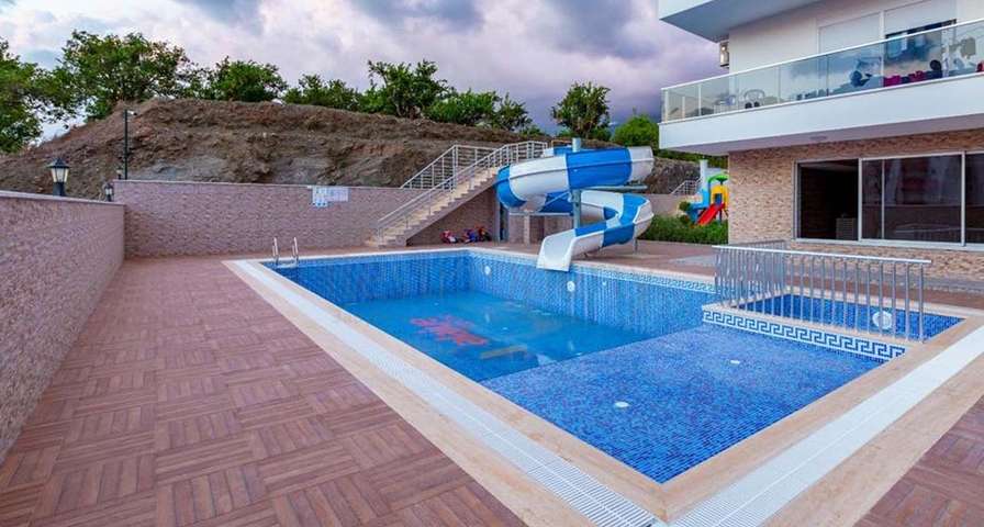 Меблированная двухкомнатная квартира в Махмутларе