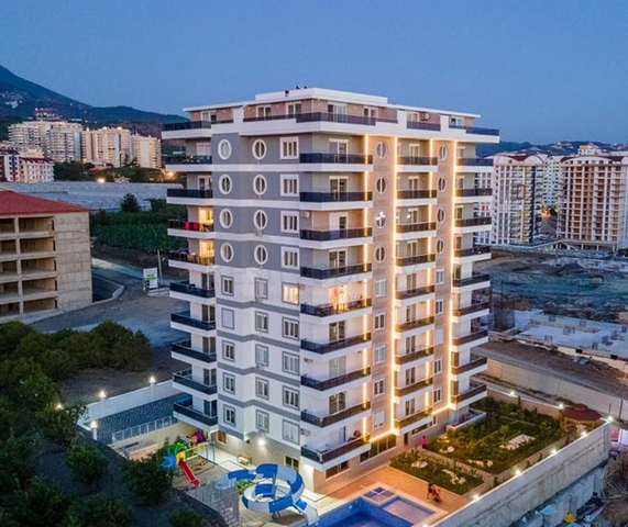 Меблированная двухкомнатная квартира в Махмутларе