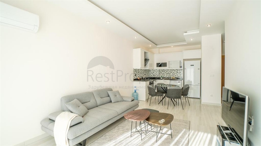 Меблированная двухкомнатная квартира в Махмутларе