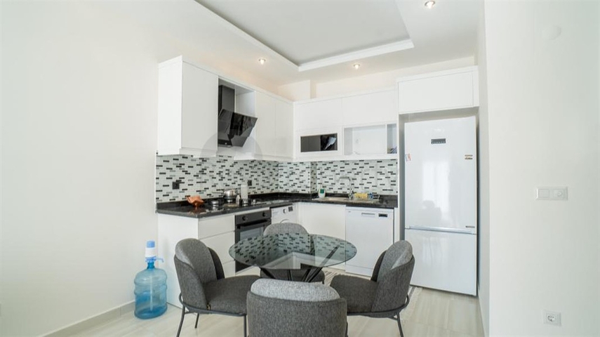 Меблированная двухкомнатная квартира в Махмутларе