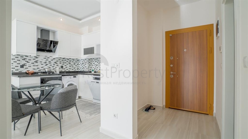 Меблированная двухкомнатная квартира в Махмутларе