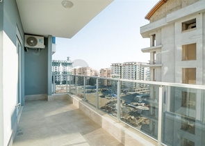 Меблированная двухкомнатная квартира в Махмутларе