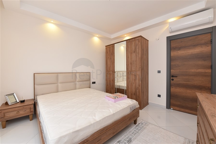 Квартира планировки 2+1 в ультрасовременном комплексе в центре Махмутлара