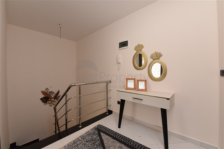 Квартира планировки 2+1 в ультрасовременном комплексе в центре Махмутлара