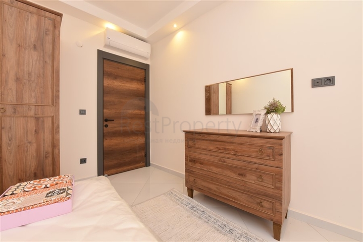 Квартира планировки 2+1 в ультрасовременном комплексе в центре Махмутлара