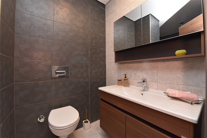 Квартира планировки 2+1 в ультрасовременном комплексе в центре Махмутлара