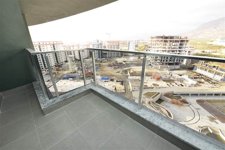 Квартира планировки 2+1 в ультрасовременном комплексе в центре Махмутлара