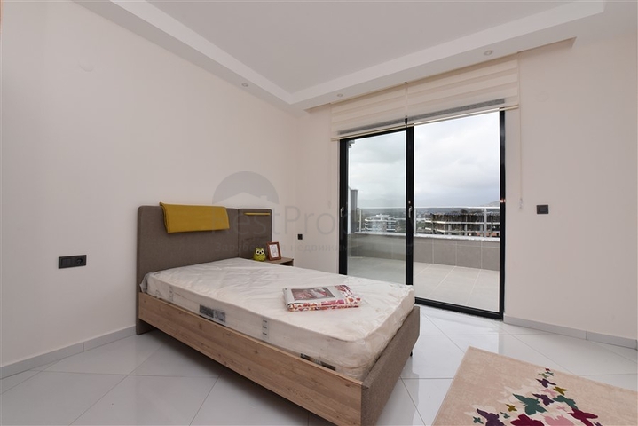 Квартира планировки 2+1 в ультрасовременном комплексе в центре Махмутлара