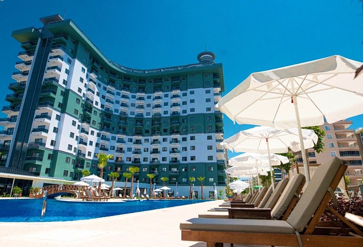 Квартира планировки 2+1 в ультрасовременном комплексе в центре Махмутлара