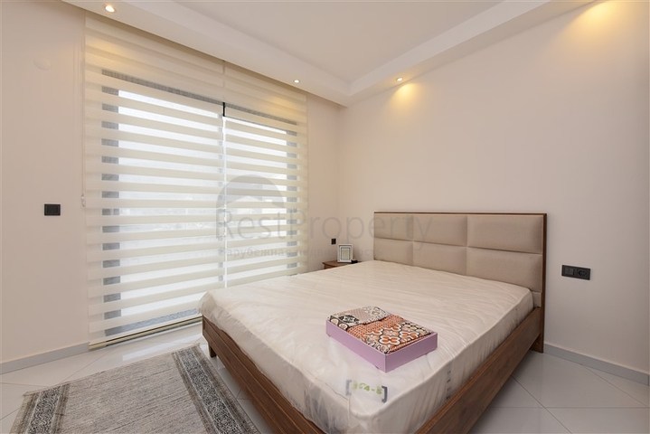 Квартира планировки 2+1 в ультрасовременном комплексе в центре Махмутлара