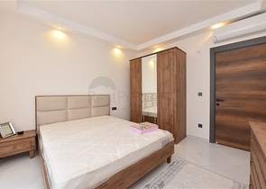 Квартира планировки 2+1 в ультрасовременном комплексе в центре Махмутлара