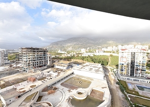 Квартира планировки 2+1 в ультрасовременном комплексе в центре Махмутлара