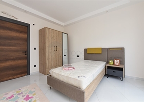 Квартира планировки 2+1 в ультрасовременном комплексе в центре Махмутлара