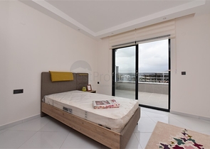 Квартира планировки 2+1 в ультрасовременном комплексе в центре Махмутлара