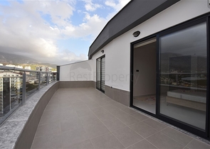 Квартира планировки 2+1 в ультрасовременном комплексе в центре Махмутлара