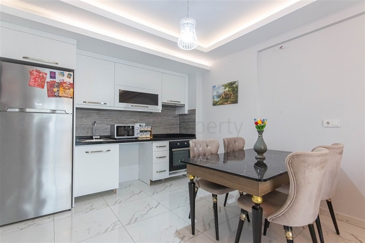 Уютная двухкомнатная квартира в Махмутларе