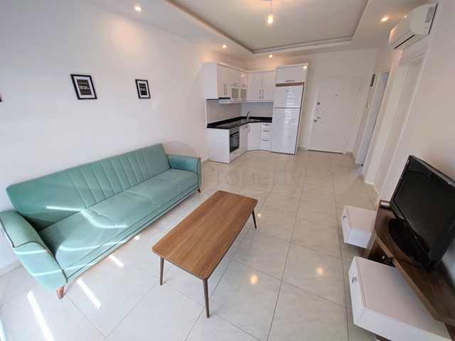 Меблированная квартира планировкой 1+1 в районе Махмутлар