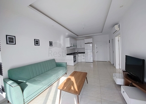 Меблированная квартира планировкой 1+1 в районе Махмутлар