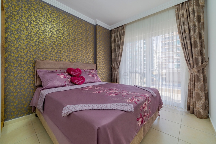 На продажу представлена двухкомнатная квартира в районе Махмутлар